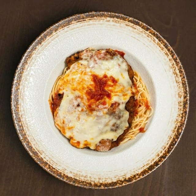 Breaded Chicken Cutlet Parm.