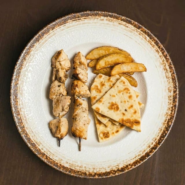 Chicken Souvlaki Platter with 2 Skewers.